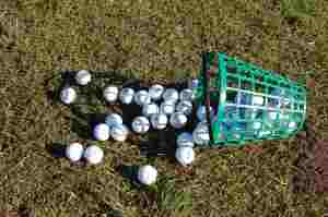 Image Of A Bucket Of Golf Balls
