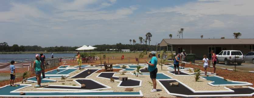 People playing putt putt golf at Forster - Tuncurry Golf Driving Range And Water Golf